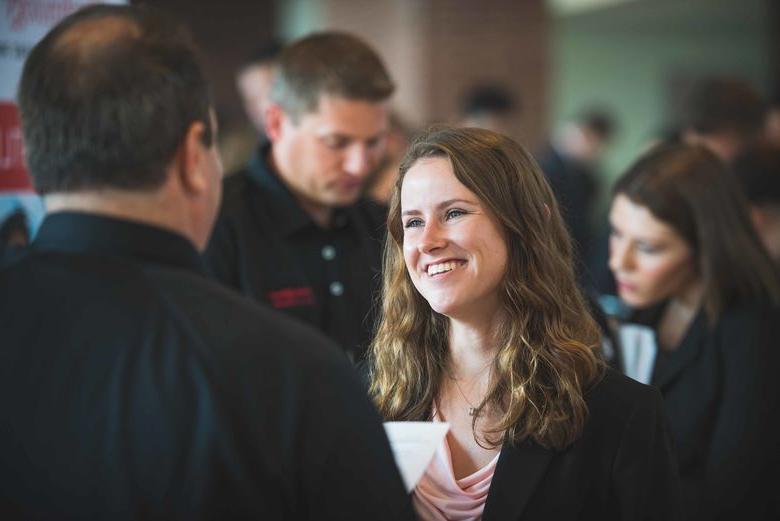 student talking to employer 